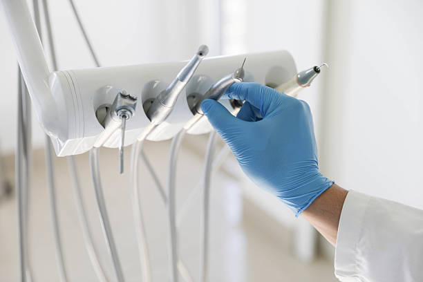 Professional Tooth Extraction technician working in South Henderson, NC